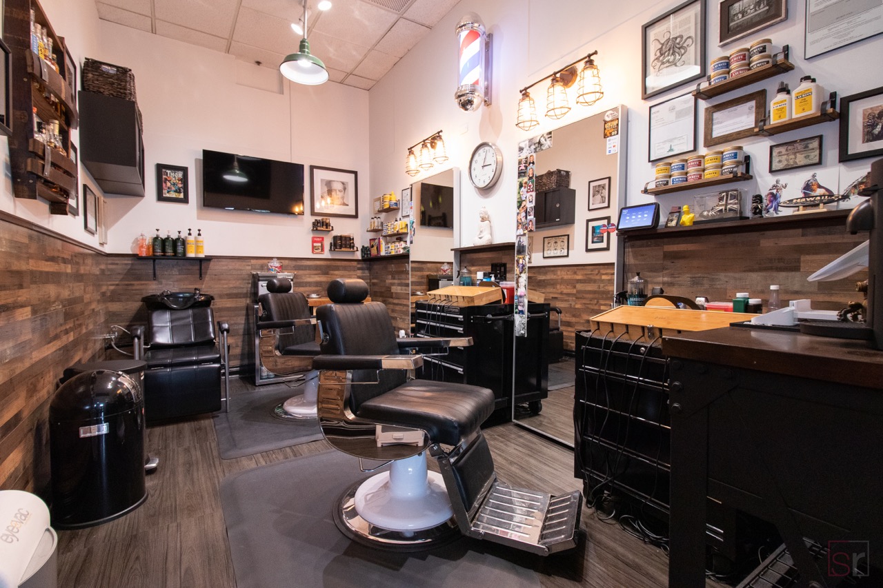 Salon studios may come with or without pre-built shelves and cabinetry. This studio was created without any supplied furnishings, allowing a more custom look.